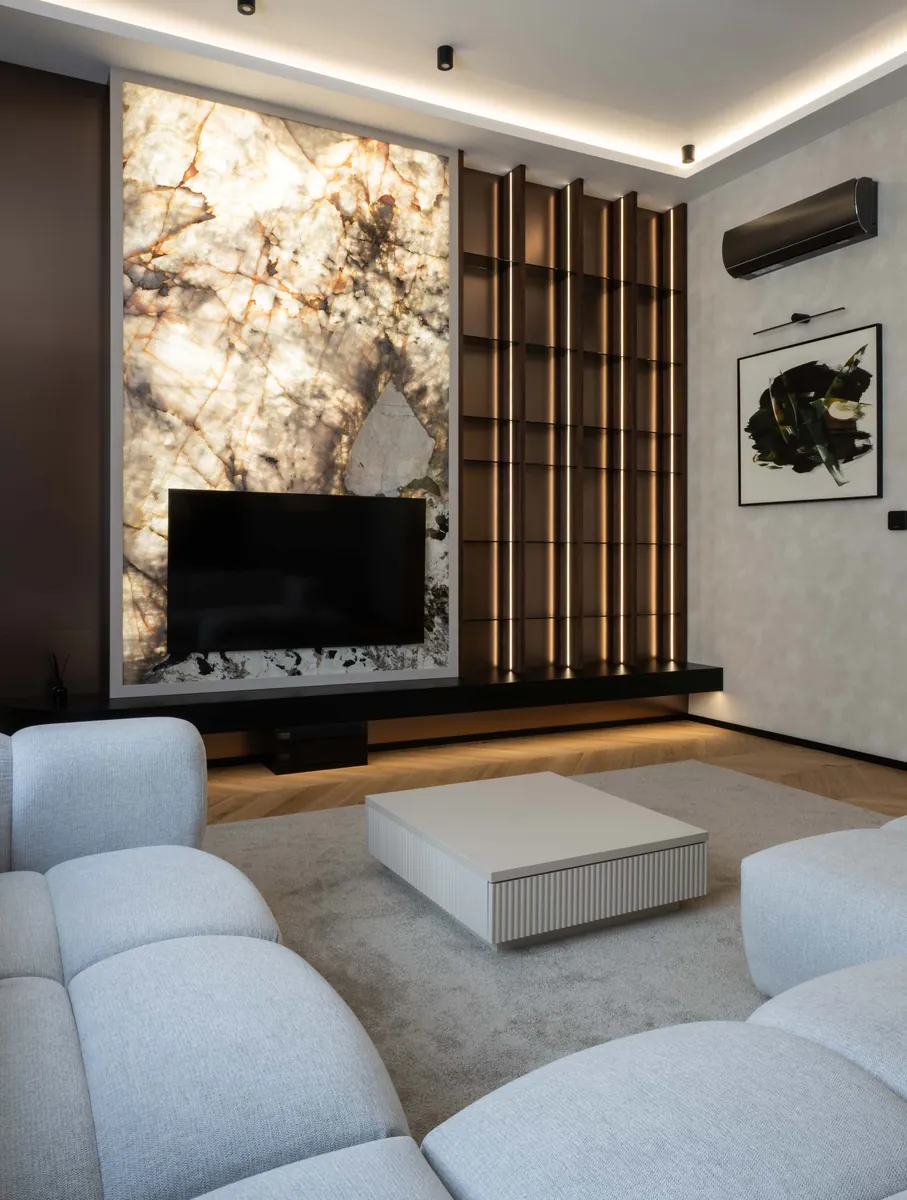 Vörösmarty – backlit stone wall and walnut shelving